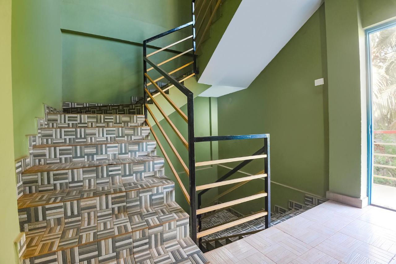 Fabexpress The Voyage Hotel Morjim Bagian luar foto