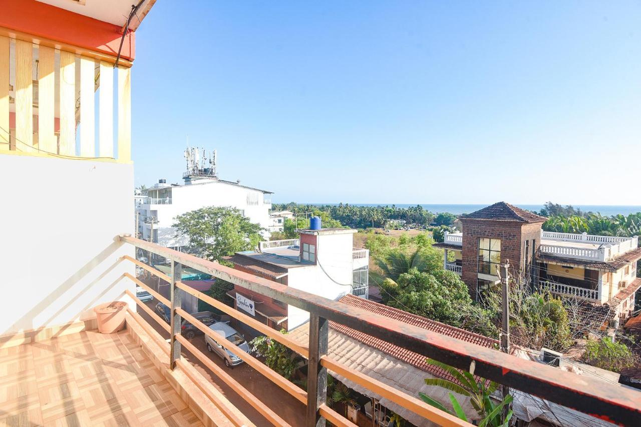 Fabexpress The Voyage Hotel Morjim Bagian luar foto