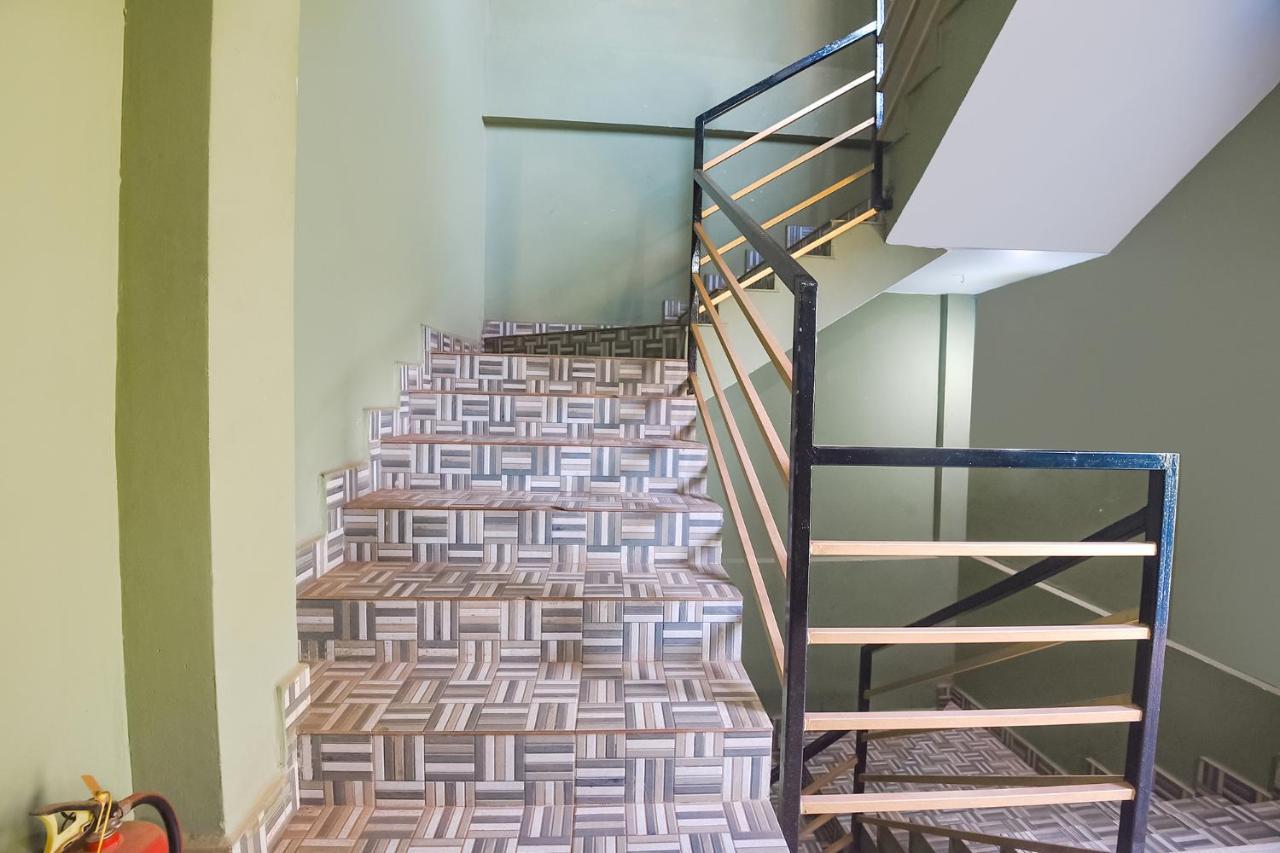 Fabexpress The Voyage Hotel Morjim Bagian luar foto